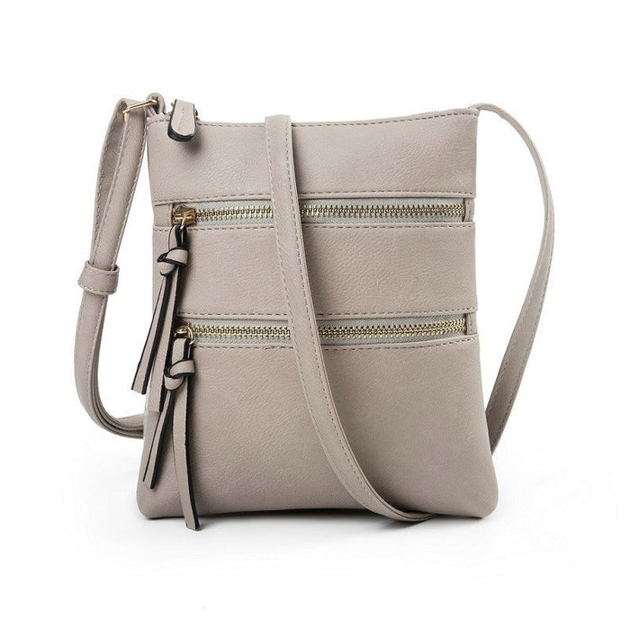 Multifunctional pocket with double zipper vertical women's bag