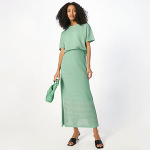 Hollow out short sleeved knitted top half skirt two-piece set